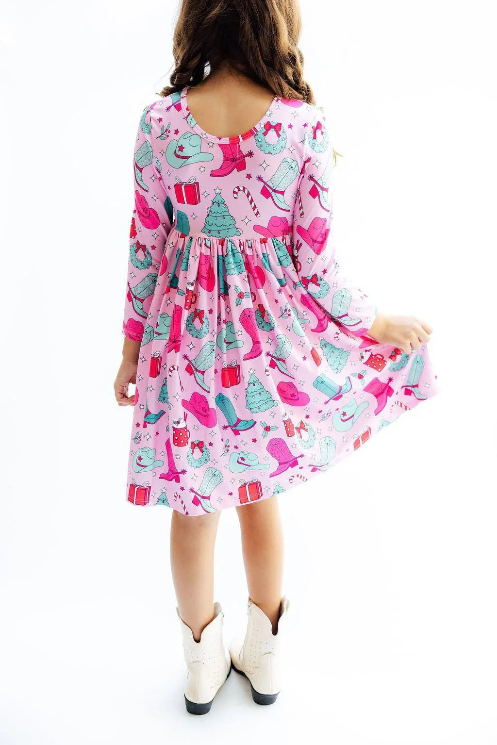 Girls pink long sleeve twirl dress with holiday print and pockets for kids