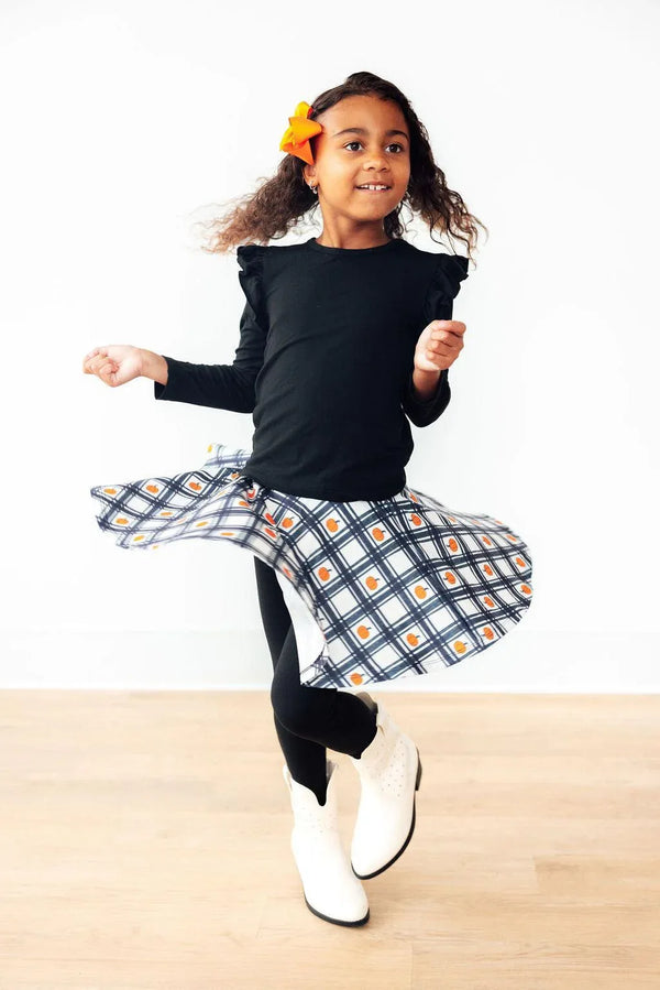 Girls black twirl skegging with plaid skirt overlay by Mila & Rose, size for young children
