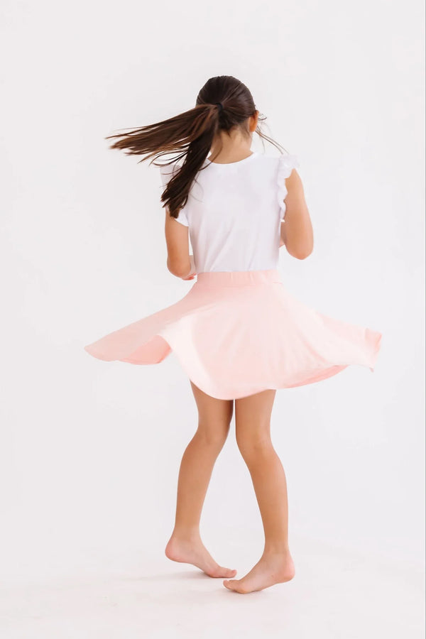 Girls light pink twirl skort by Mila Rose with flowy design perfect for active play