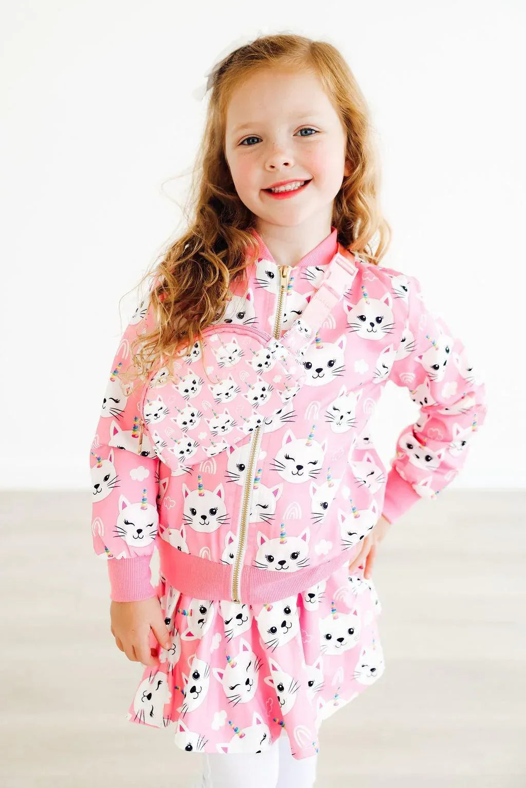 Girls pink satin jacket with unicorn kitties print by Mila & Rose for young girls