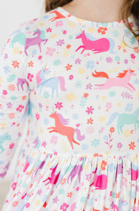 Girls unicorn twirl dress for girls by Mila & Rose with colorful unicorn and floral print in 3/4 sleeve