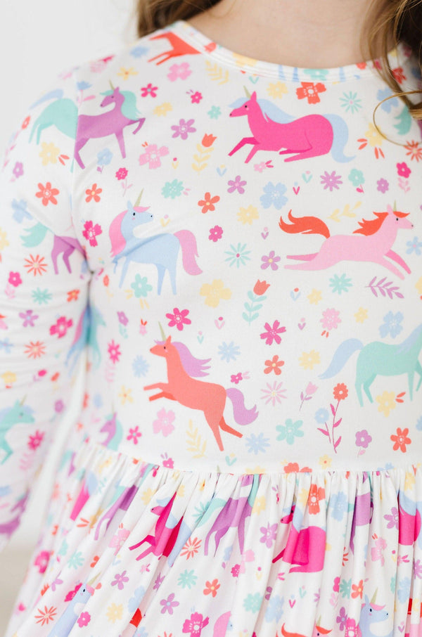 Girls unicorn twirl dress for girls by Mila & Rose with colorful unicorn and floral print in 3/4 sleeve