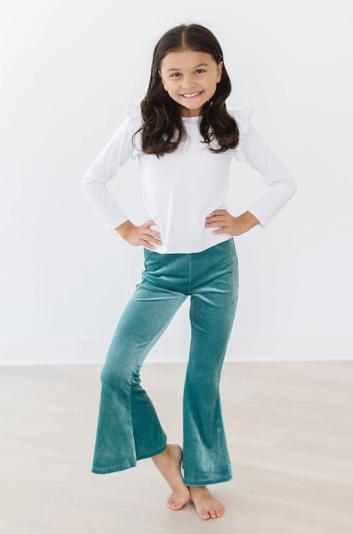 girls teal velvet bell pants with flare legs and soft texture by Mila & Rose