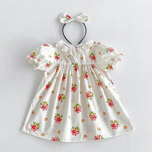 White floral vintage sibling outfits for girls dress with puff sleeves and matching bow headband for toddlers