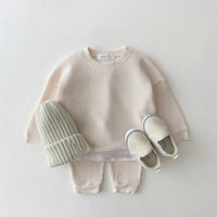 cream waffle cotton baby knit set size 73 with matching knit hat and beige slip-on shoes