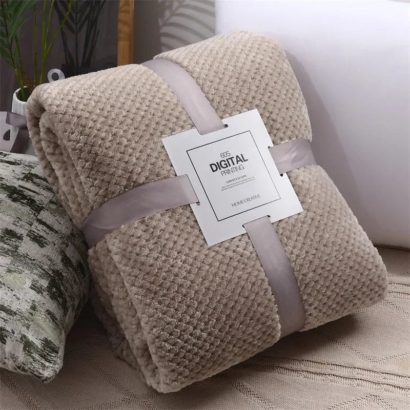 Beige waffle cut baby blanket swaddle for infants with soft textured fabric and cozy warmth