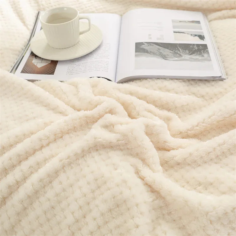 Ivory waffle cut baby blanket swaddle with soft texture for newborns and infants