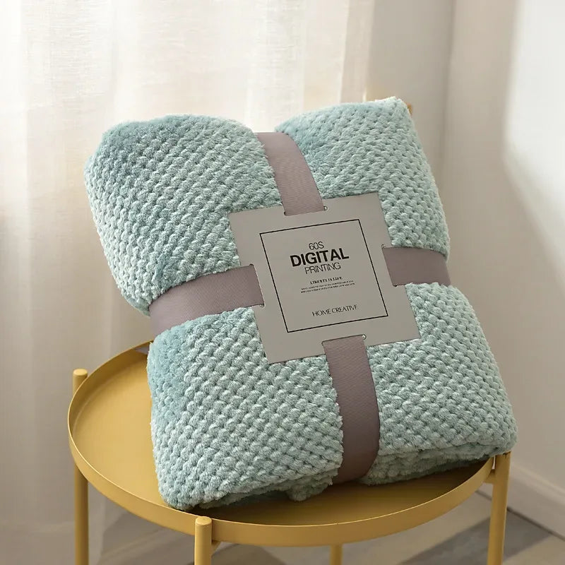 Light blue waffle cut baby blanket swaddle suitable for newborns with soft textured fabric