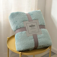 Light blue waffle cut baby blanket swaddle suitable for newborns with soft textured fabric