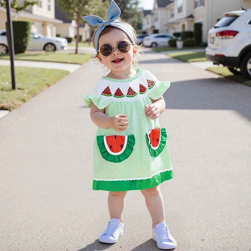 Toddler girls watermelon baby dress in green with watermelon slice pockets and ruffle sleeves