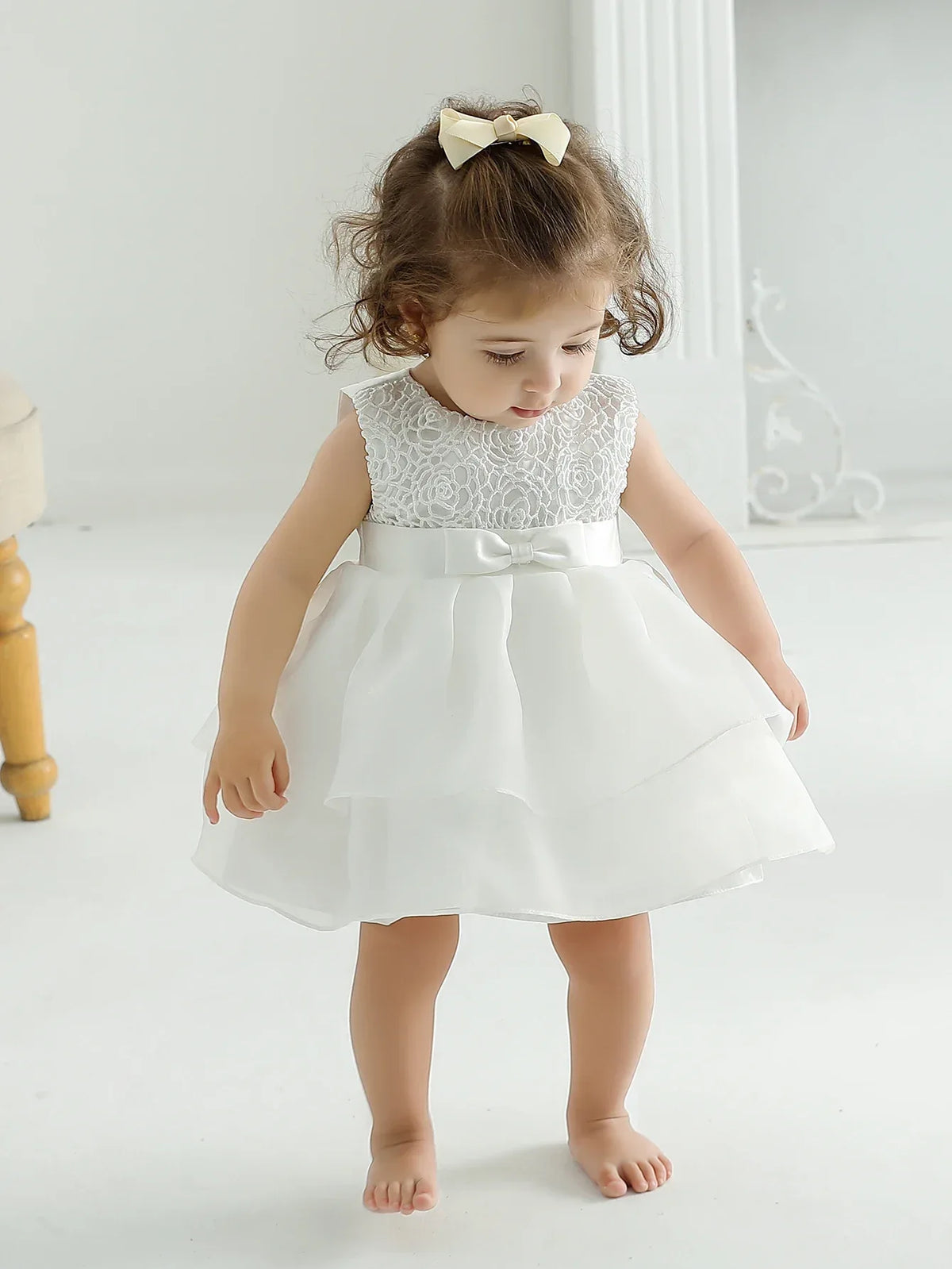Toddler white baby occasion dress with lace bodice and bow detail for babies and toddlers