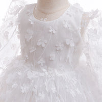 baby baptism gown with white flower girl dress with headband detail on mannequin
