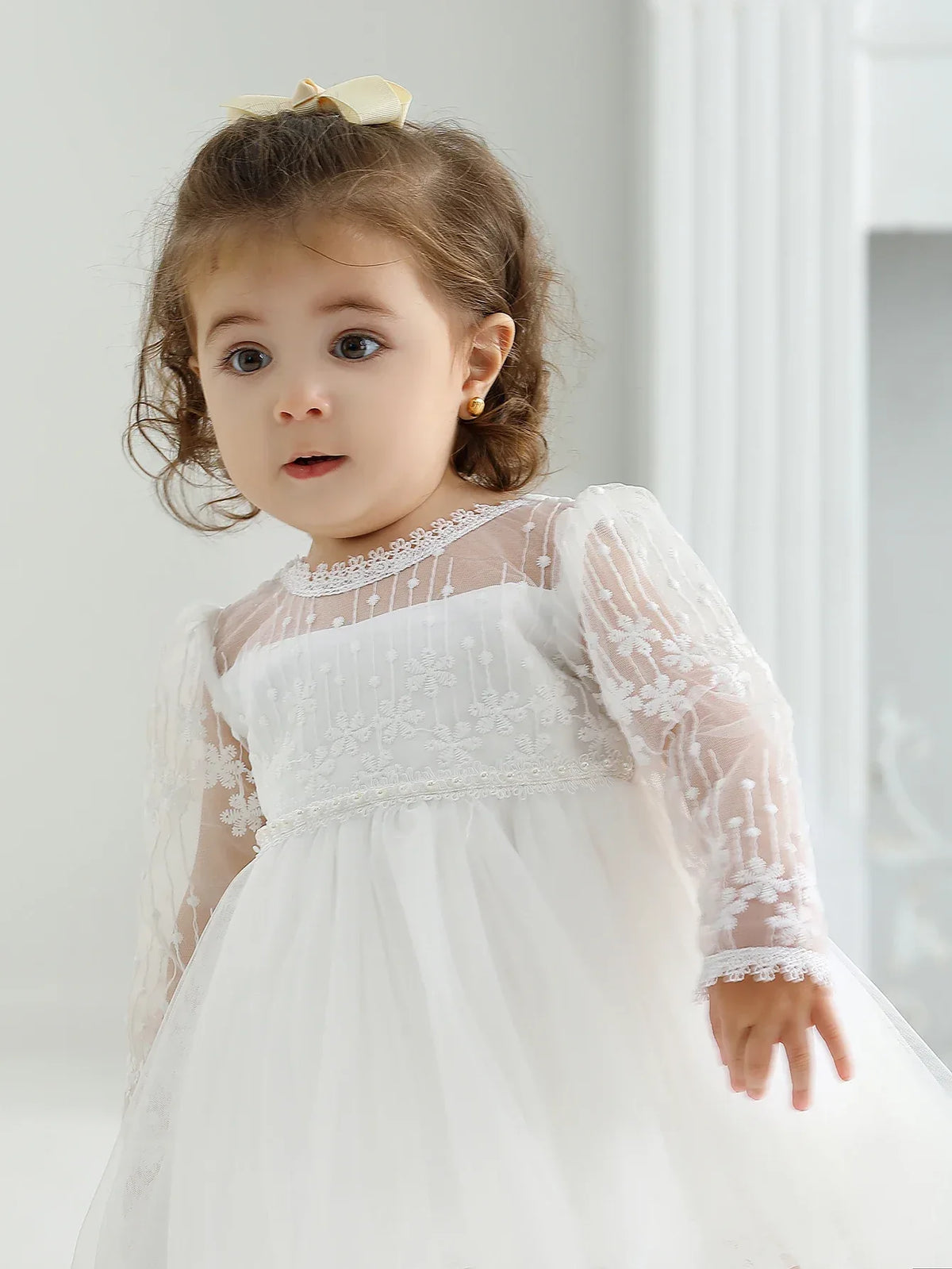 White lace occasion dress for little girls, babies toddler size with sheer long sleeves and floral details