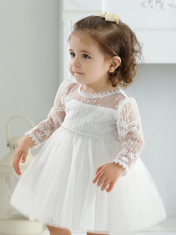 White lace occasion dress for little girls, toddler size, with sheer long sleeves and floral embroidery
