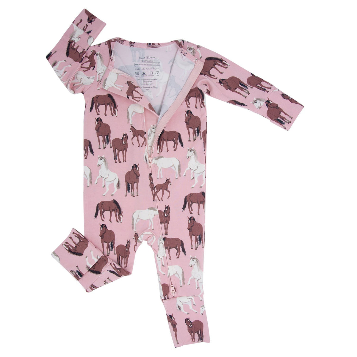 Baby romper with horse pattern on a pink background