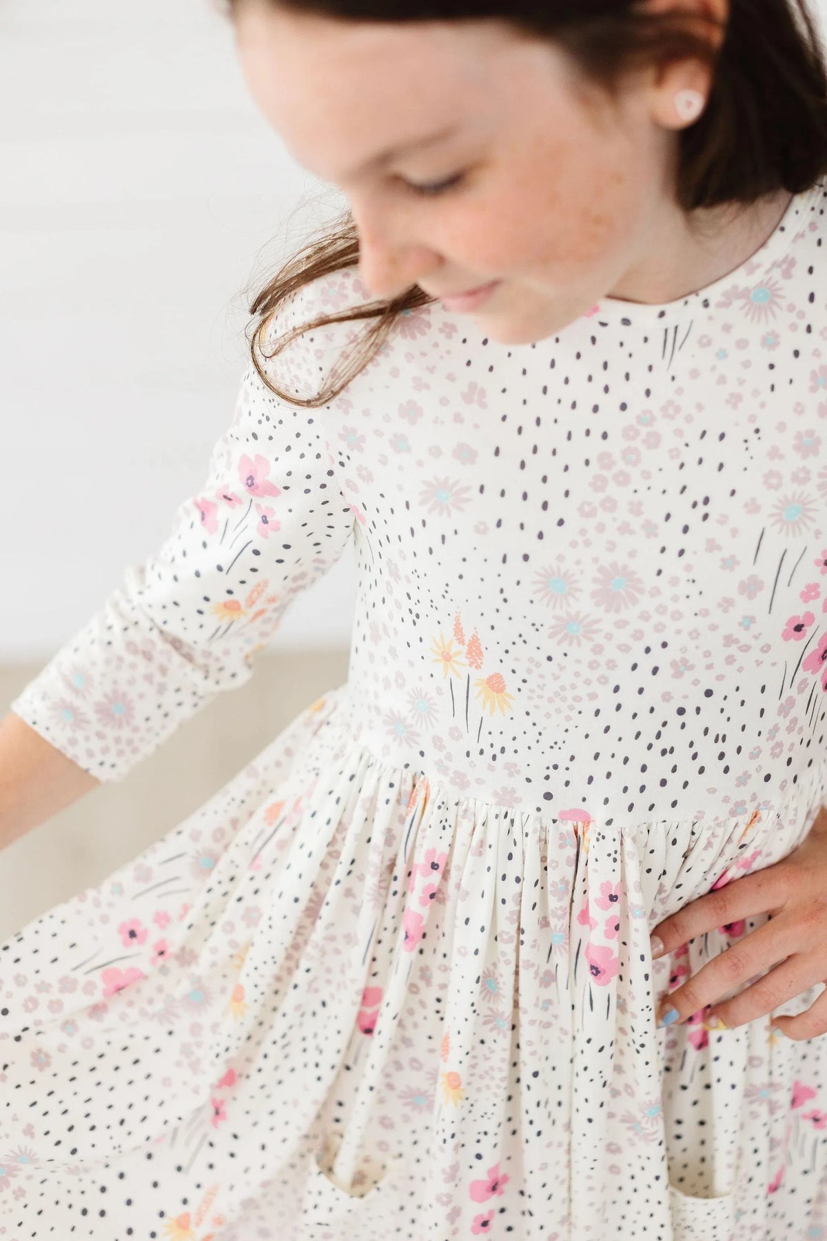 Mila & Rose wildflower twirl dress for girls, white 3/4 sleeve with colorful floral print and pockets