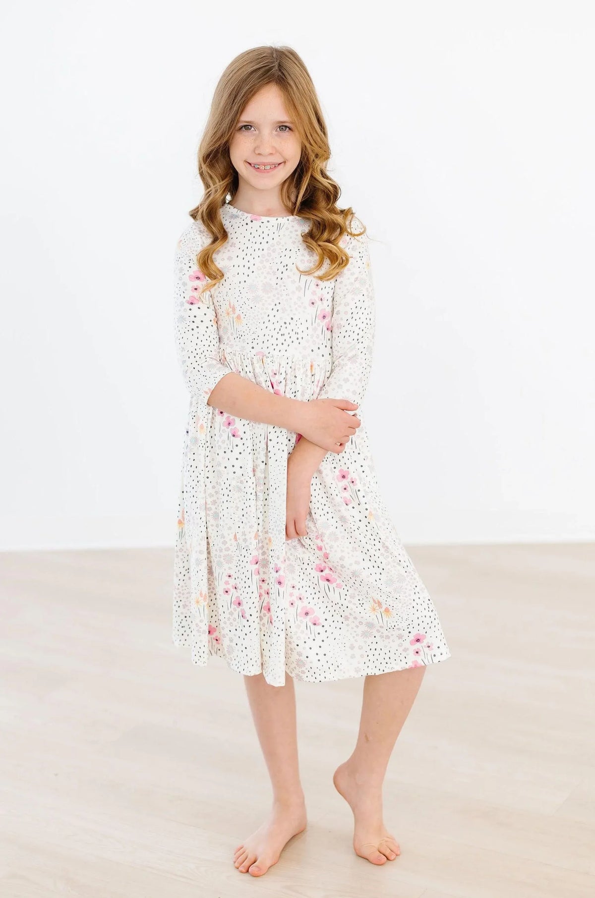 Girls white wildflower twirl dress for girls with 3/4 sleeves and pocket by Mila & Rose