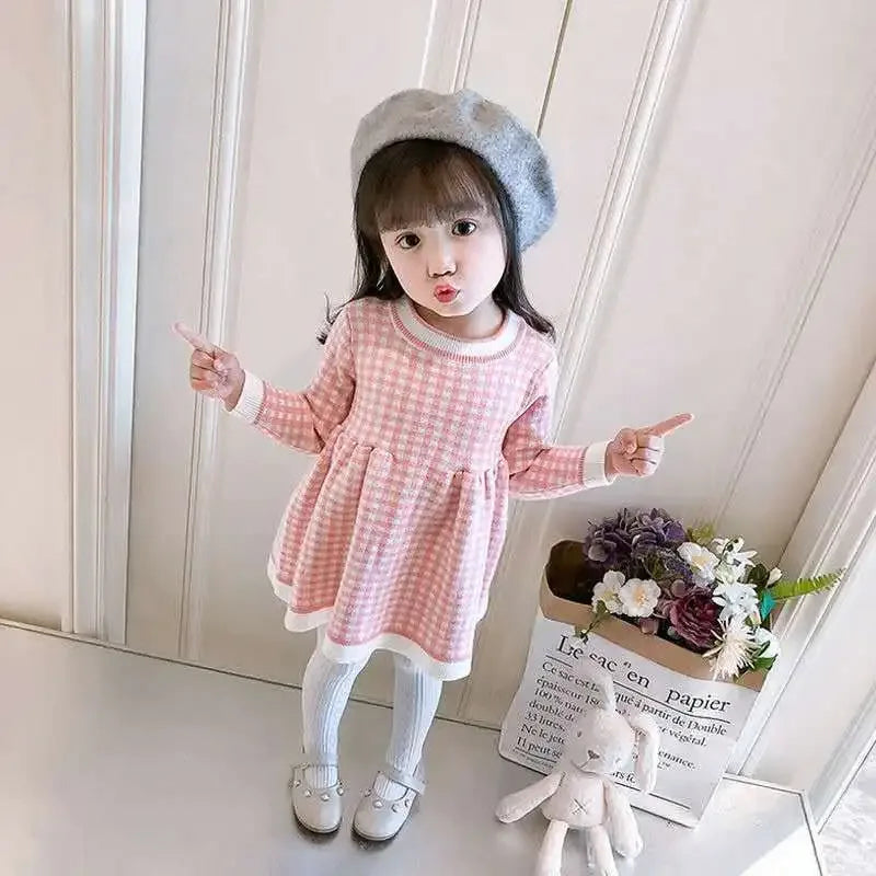 Pink and white winter knit dress for little girls with long sleeves and checkered pattern
