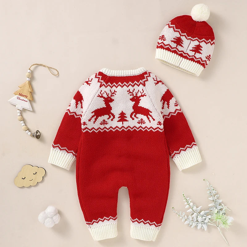 Red and white winter knit rompers for babies with reindeer and tree pattern and matching pom pom hat