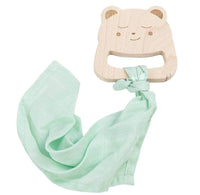 Light green soft blanket attached to a wooden baby teether shaped like a bear for newborns
