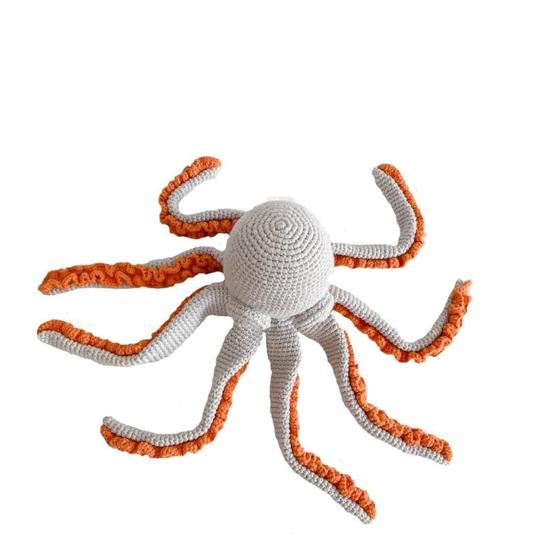 Grey crochet octopus with eight curling arms and bright orange undersides. Soft organic cotton toy perfect for nurseries and children's rooms.