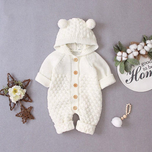 Cream baby hooded knit romper with wooden buttons and textured knit pattern for newborns