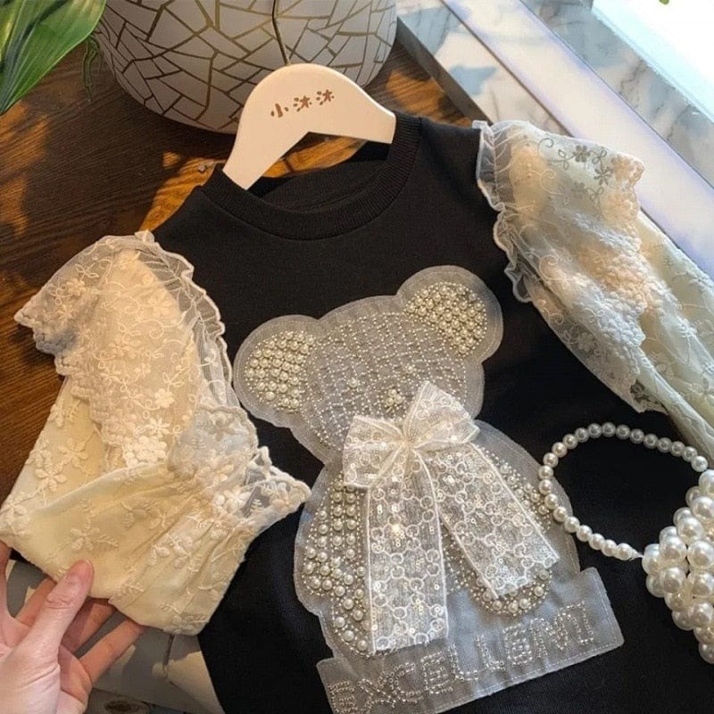 black childrens dress with pearl lace teddy bear applique and cream pearl lace sleeves for kids