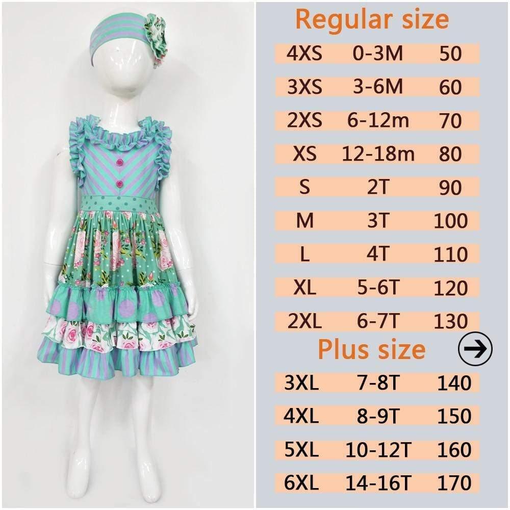 toddler mannequin wearing green and pink boho toddler dress set with floral pattern and matching headband
