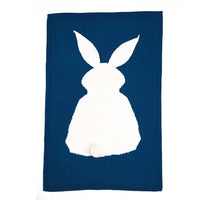 Navy blue bunny baby blanket with white bunny silhouette and pompom tail for infants