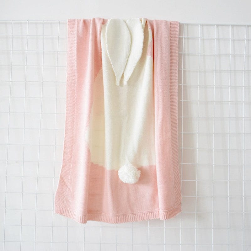 Pink and white bunny baby blanket swaddle with ears and pompom tail for newborns