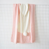 Pink and white bunny baby blanket swaddle with ears and pompom tail for newborns