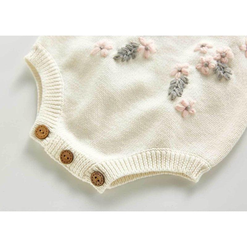 Cream crocheted floral baby romper set for newborns with pink flower and gray leaf embroidery