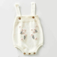 cream crocheted floral baby romper set with pink and gray flower details for infants