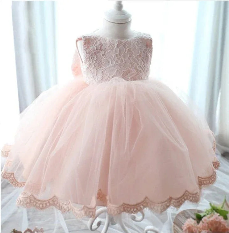 baby girl tulle dress with bow in light pink lace bodice and scalloped hem for infants