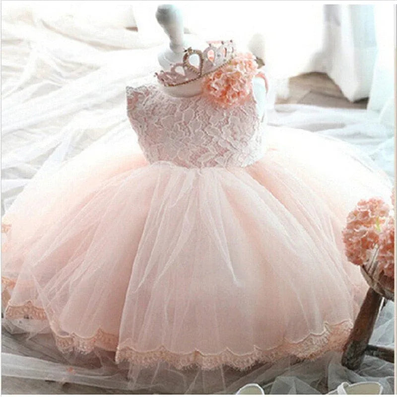 baby girl tulle dress with bow in soft pink lace bodice and full layered skirt for infants