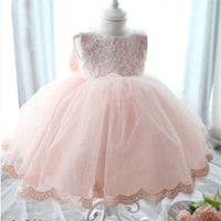 baby girl tulle dress with bow in light pink lace bodice and scalloped hem for infants