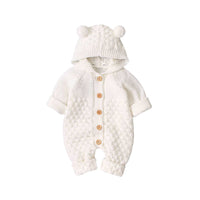 White hooded knitted romper for babies with bear ears and wooden button details