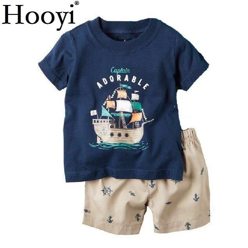 Navy blue toddler t-shirt with ship print and beige shorts with nautical patterns childrens summer shorts set