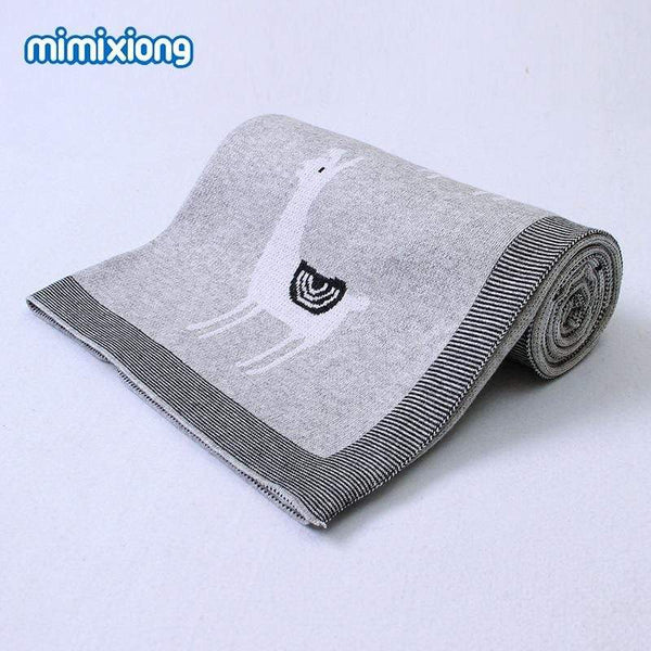 Gray soft knitted baby blanket with llama design and striped edges for infants