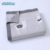 Gray soft knitted baby blanket with white llama design, suitable for infants and toddlers