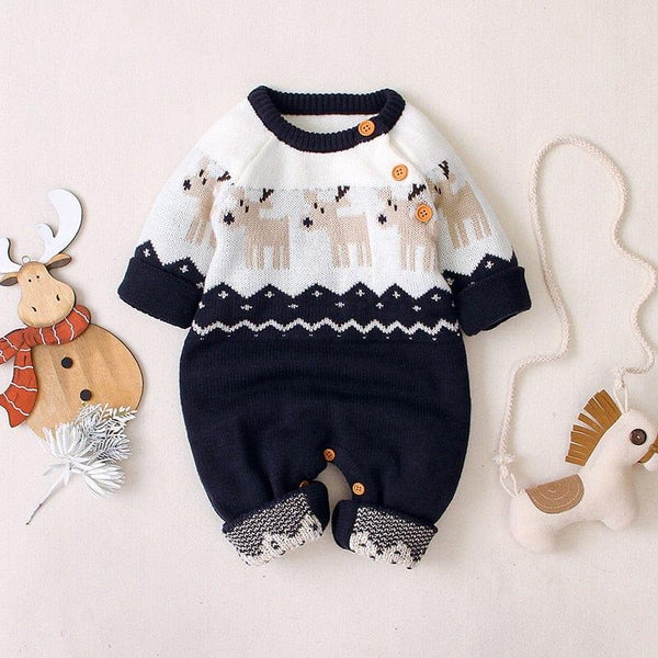 Navy and white reindeer baby romper for infants with button details and long sleeves