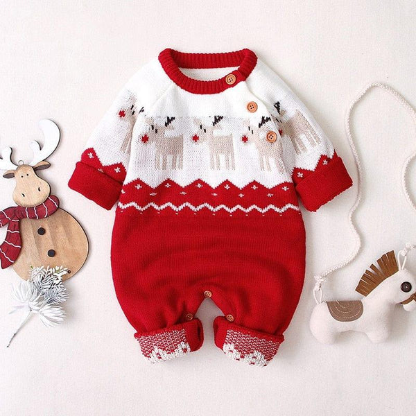 Red and white reindeer baby romper with buttons on shoulder and long sleeves for infants