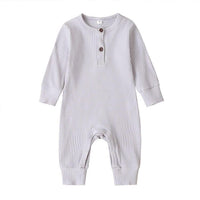 Light gray ribbed knit baby toddler romper with long sleeves and button closure for infants