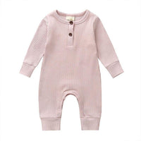 Pink ribbed knit baby toddler romper with long sleeves and button details for infants