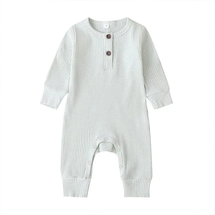 White ribbed knit baby toddler romper with long sleeves and button detail