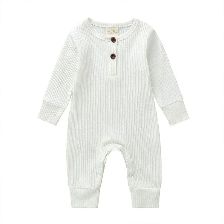 white ribbed knit baby toddler romper with long sleeves and button details